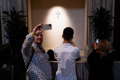 Thousands pack church to visit Pope's tomb