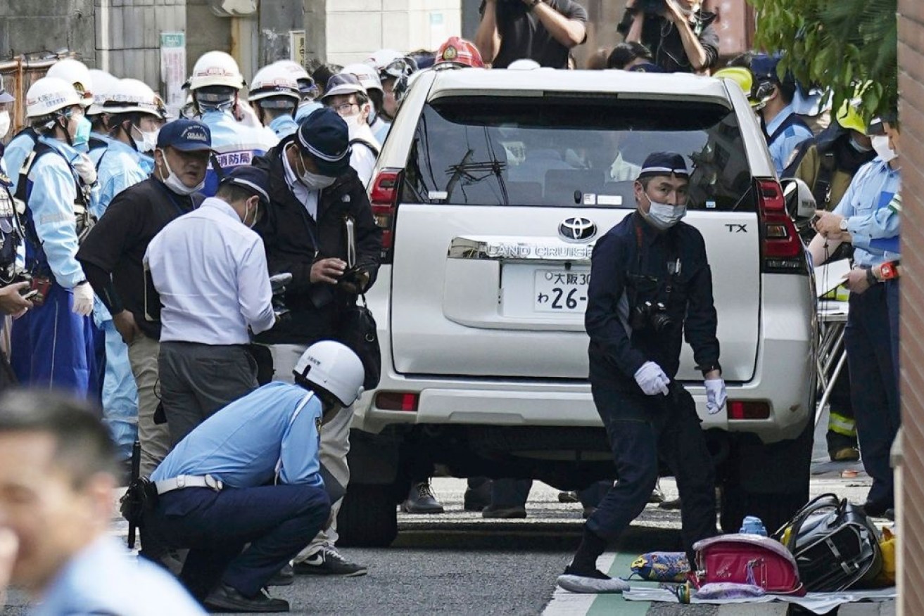 Japanese police have detained a man suspected of driving into children in Osaka.