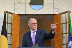 PM hits ground for second term as seats go down to the wire