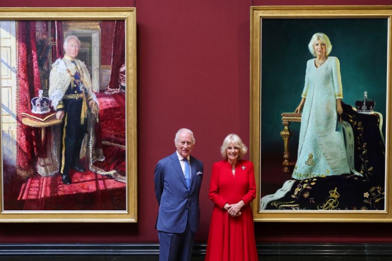 King and Queen unveil coronation portraits