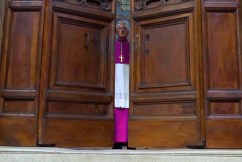 Black smoke rises over Vatican in secretive vote