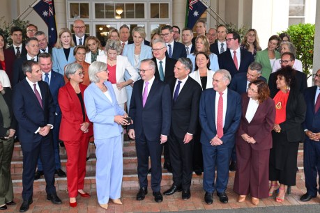 Labor ministers all smiles at swearing-in