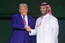 Trump lifts Syria sanctions on first foreign tour