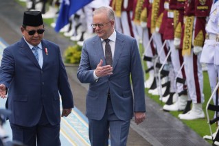 Albanese receives surprise Indonesia hotel visit 
