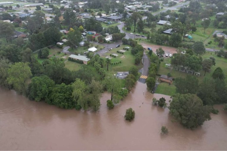 Residents stranded on roofs amid record floods