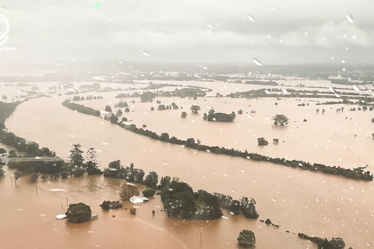 Two dead, 'grave fears' for two missing in floods