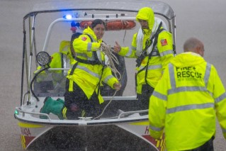 Fourth flood death as weather chaos tracks south
