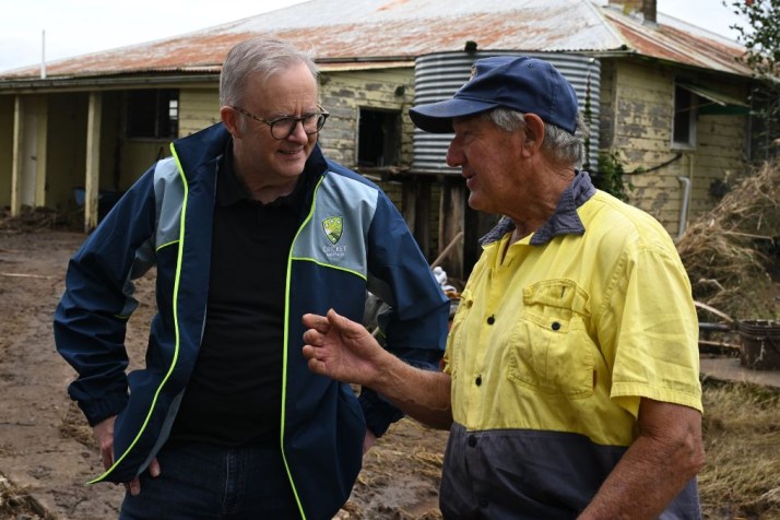 Albanese visits flood zone as troops roll in 