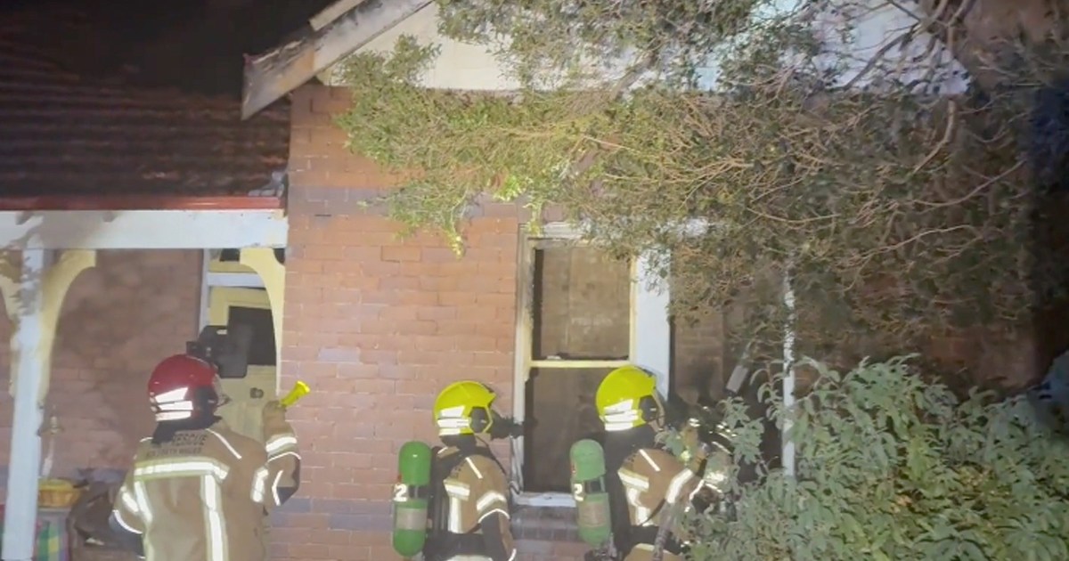 Man dead in house fire amid search for younger relative