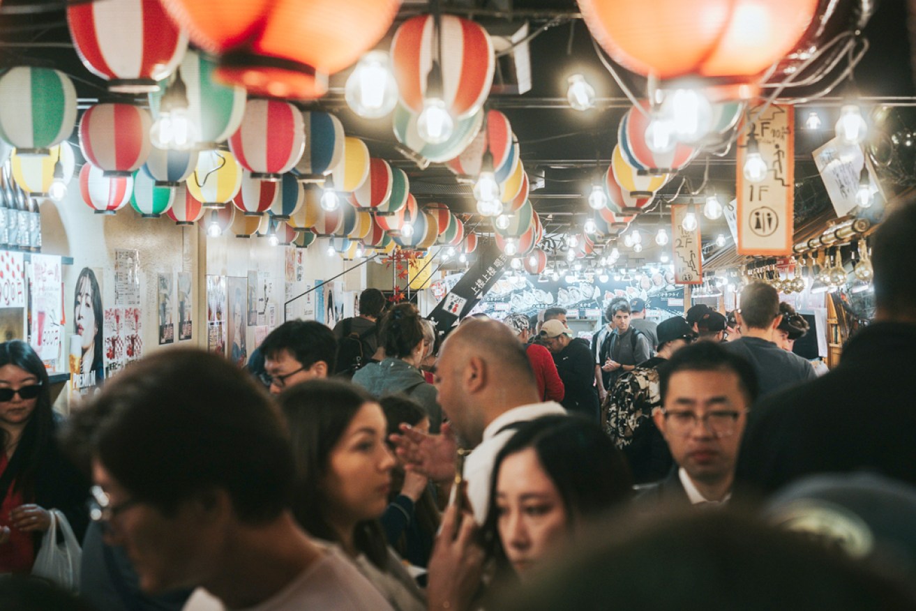 Kyoto's Nishiki Ichiba draws people interested in all kinds of delicacies.