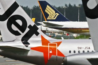 Jobs to go as Qantas axes budget carrier
