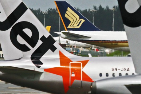 Jobs to go as Qantas axes budget carrier