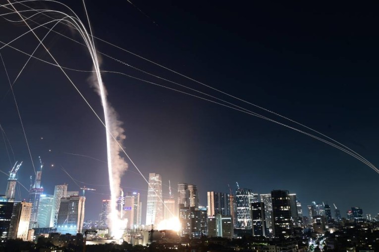 Air raid sirens, explosions, as Iran strikes Israel