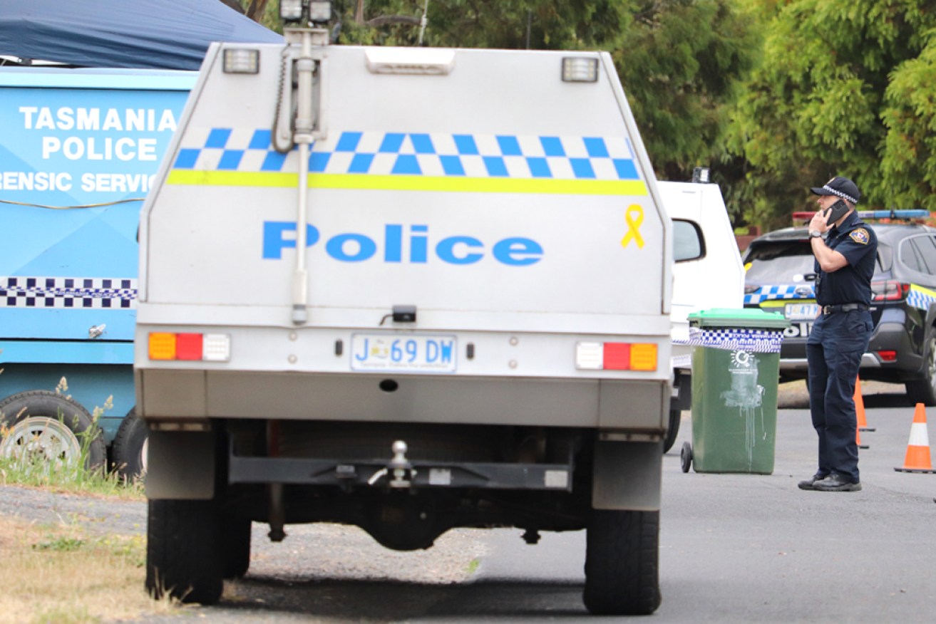 A police officer has been shot dead during a routine property visit in Tasmania's north-west.