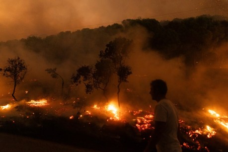 Thousands evacuated as fires threaten Greece, Crete