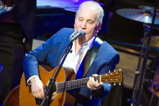 Paul Simon has surgery for ‘intense’ back pain