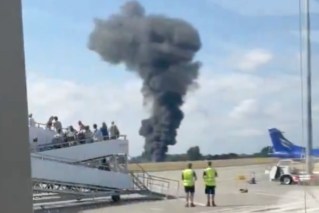 Fiery plane crash closes London airport