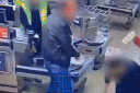 Officer charged over wild checkout brawl 