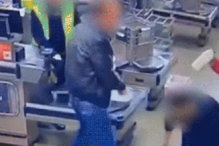 Officer charged over wild checkout brawl 