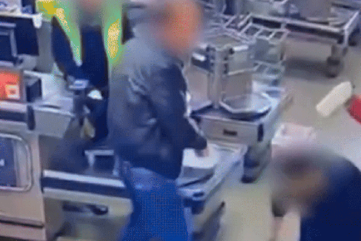 Officer charged over wild checkout brawl 