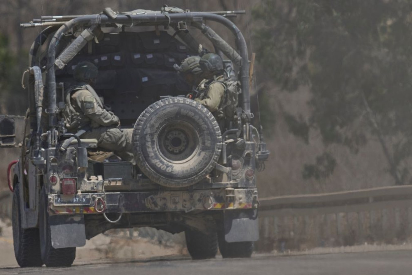 The Israel army says it fired warning shots at suspects who approached its troops and did not stop.