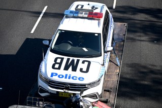 Police car in multicar crash, scooter rider dead
