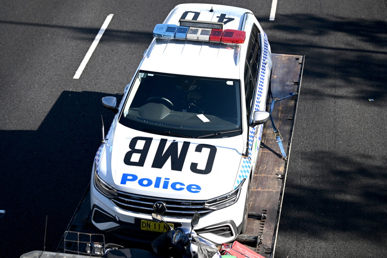 One man is dead after being hit by three cars, including a police car, in Sydney's west.