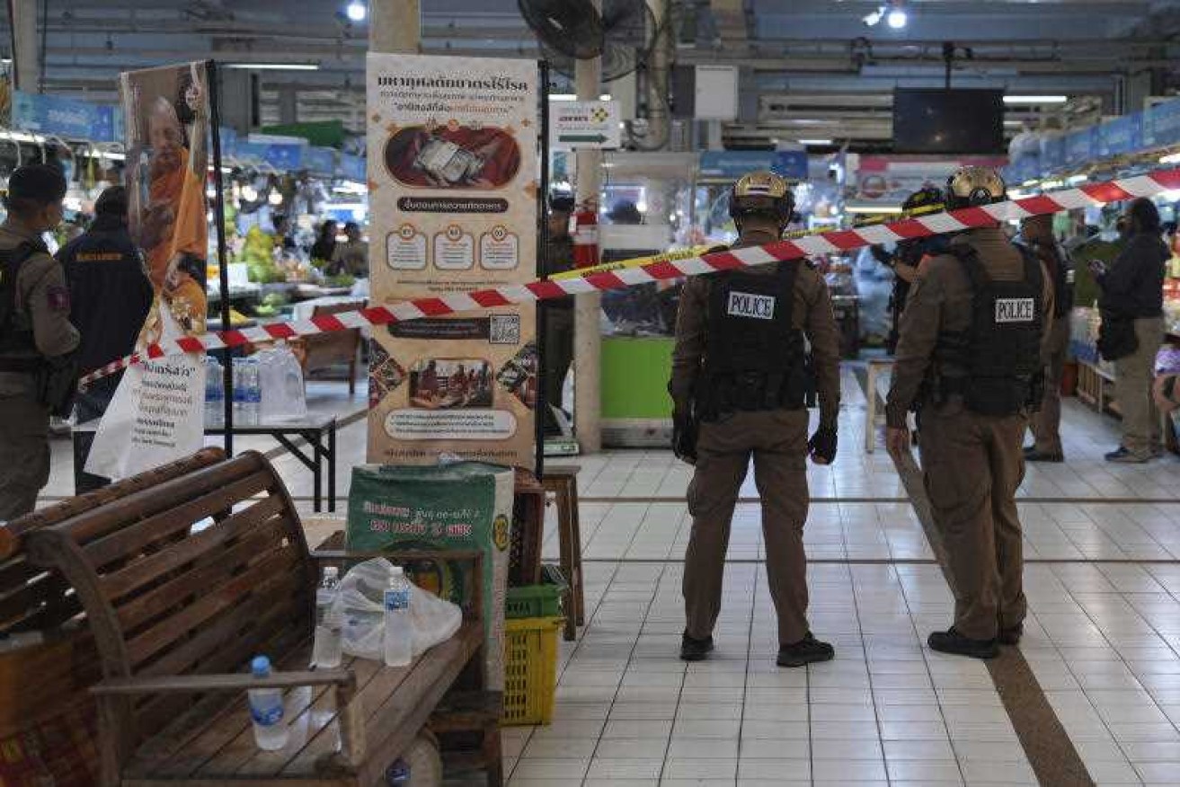 Police are investigating a shooting at a market in Bangkok that left five security guards dead.