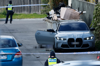 Man killed in daylight laneway shooting