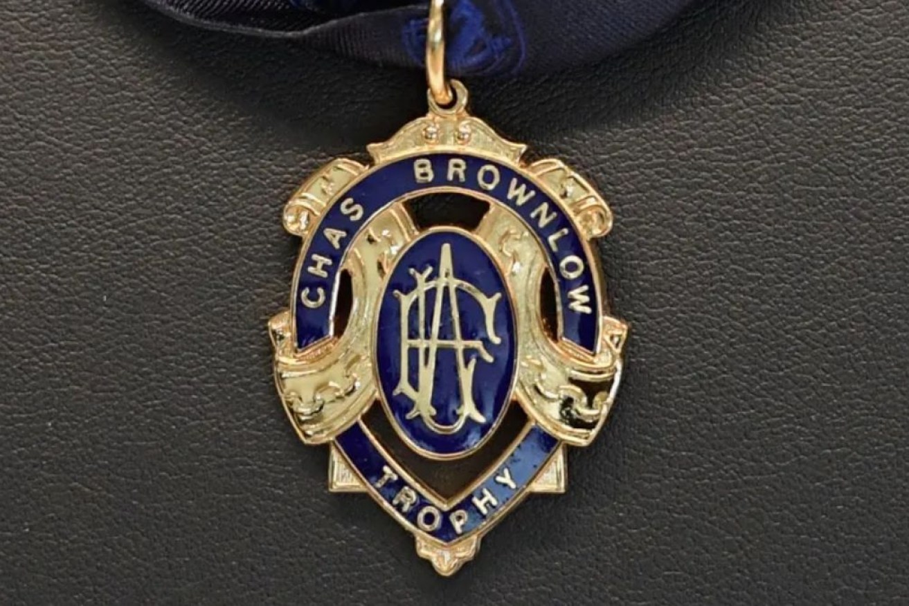 Four men charged after Brownlow Medal betting scandal