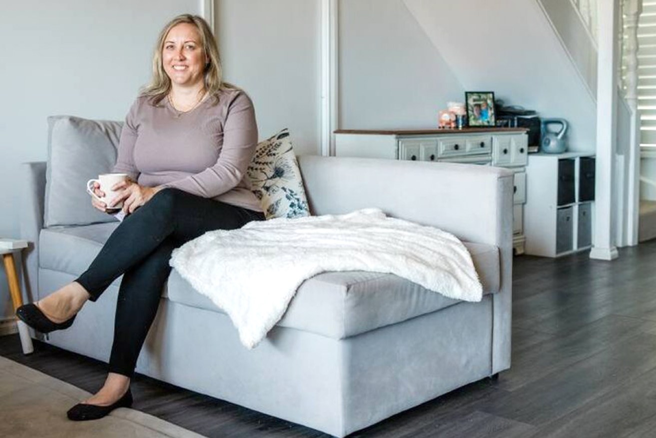 Renee Brown moved back in with family to help save to buy her first home.
