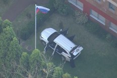 Panic as car crashes into Russian consulate