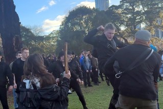 'Disgraceful': Marchers storm Indigenous group