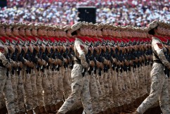 Ex-premier joins guests at China's military spectacle
