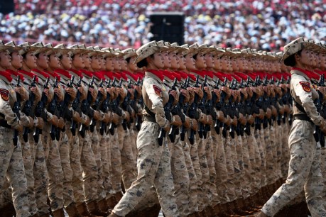 Ex-premier joins guests at China's military spectacle