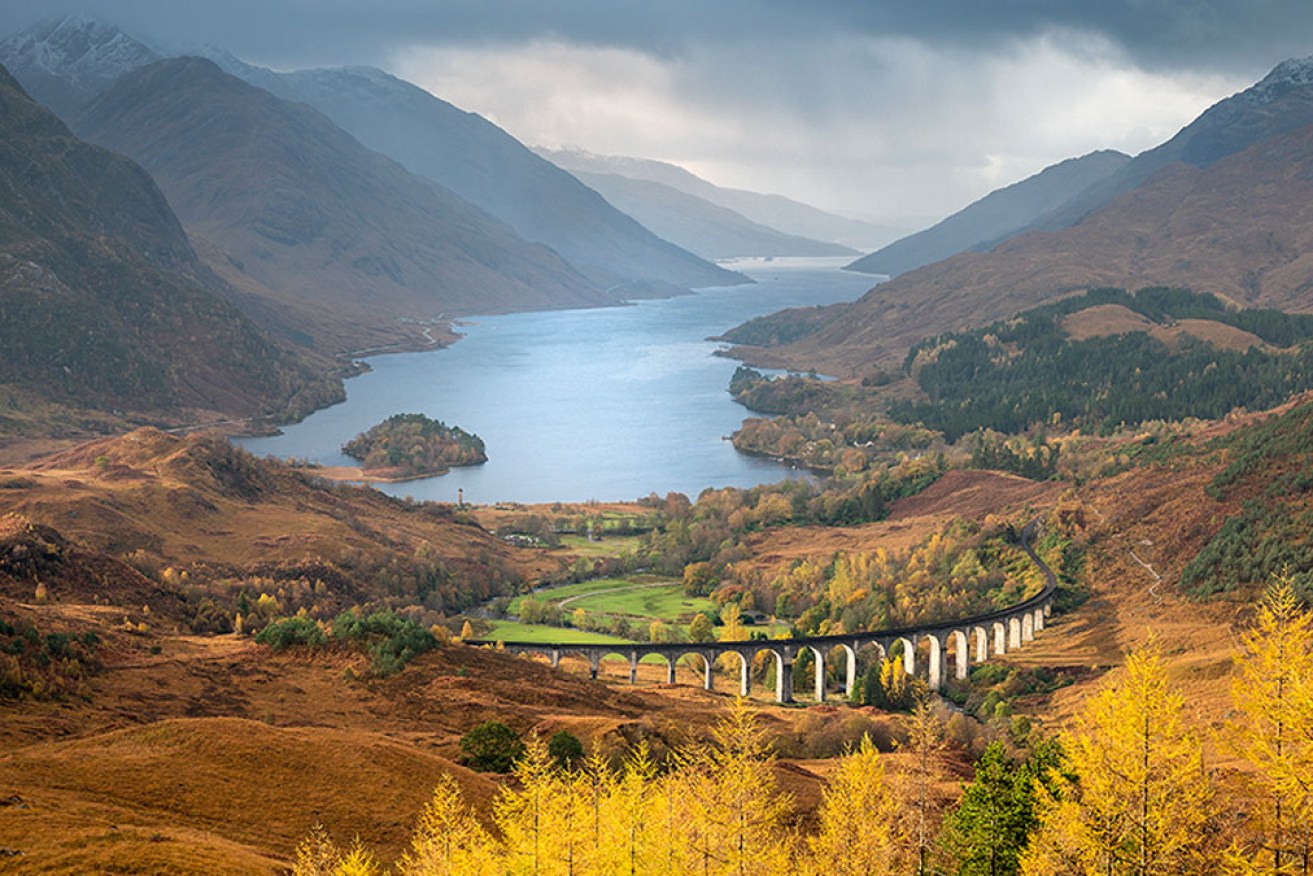 Glenfinnan Viaduct, made famous in the <i>Harry Potter</i> films, looks even more spectacular in autumn. <i>Photo: Roman Popelar / Flickr</i>