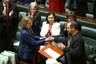 'Side by side': First treaty signed into law