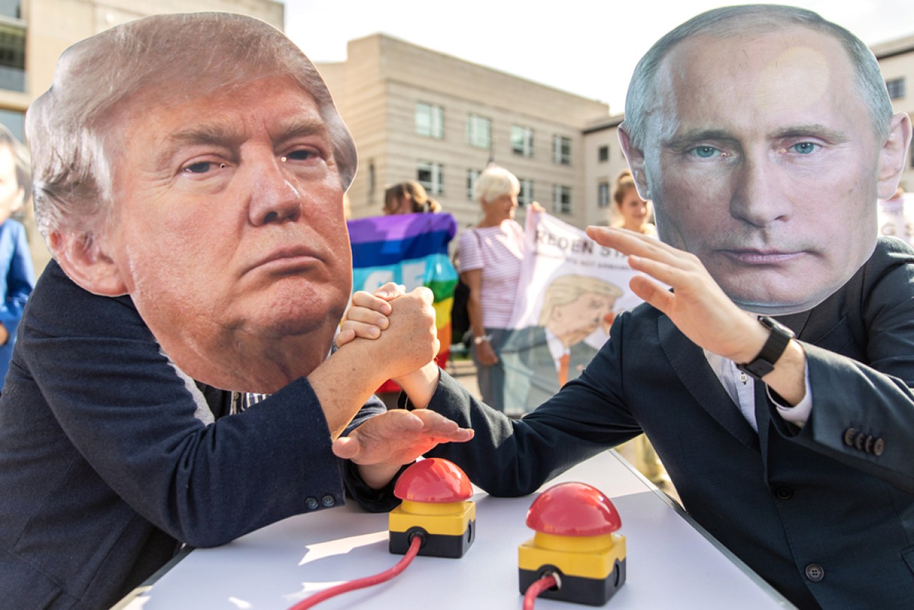 Activists wear Trump and Putin masks at an anti-nuclear protest in Germany in 2019.