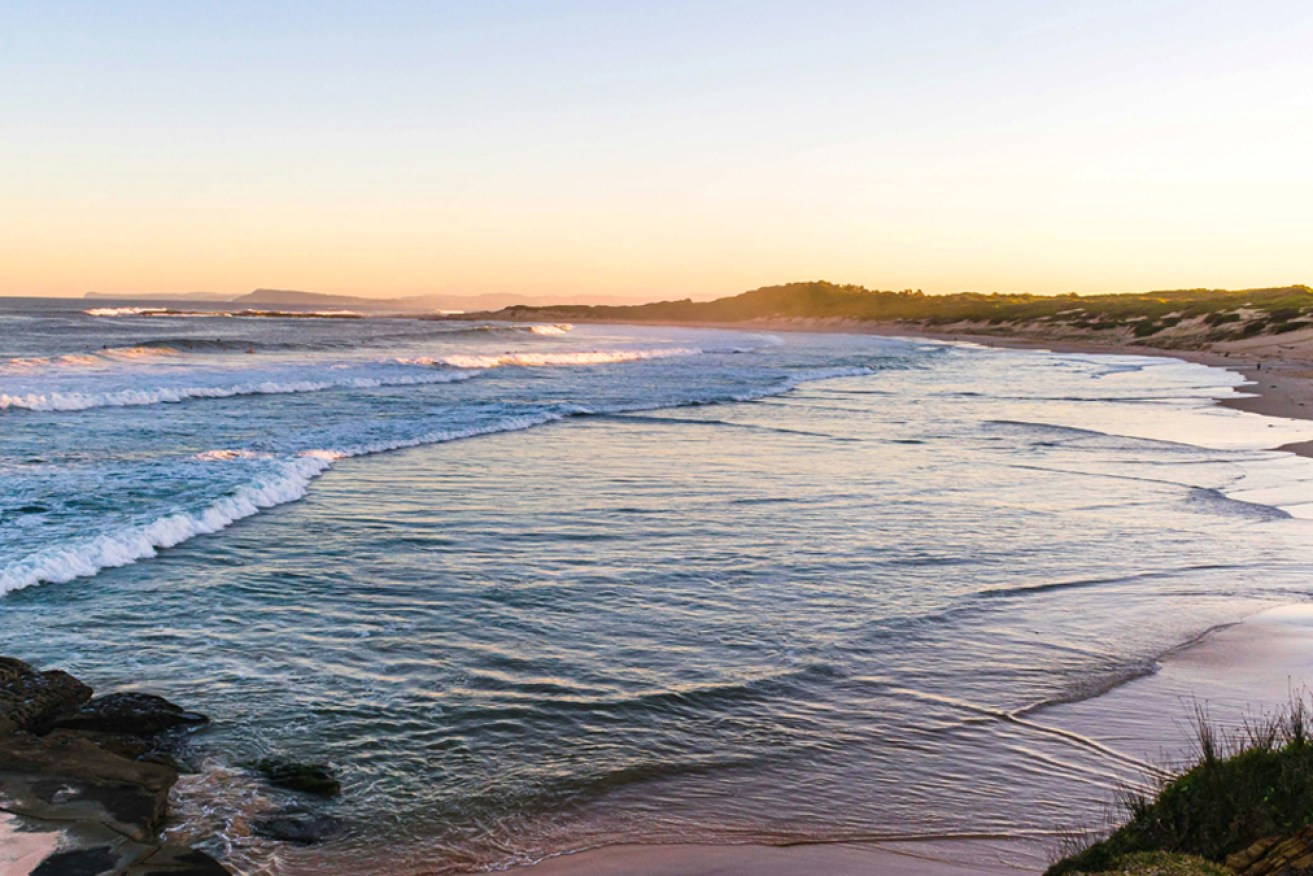 The missing man is one of two swept out to sea when a sandbar collapsed.