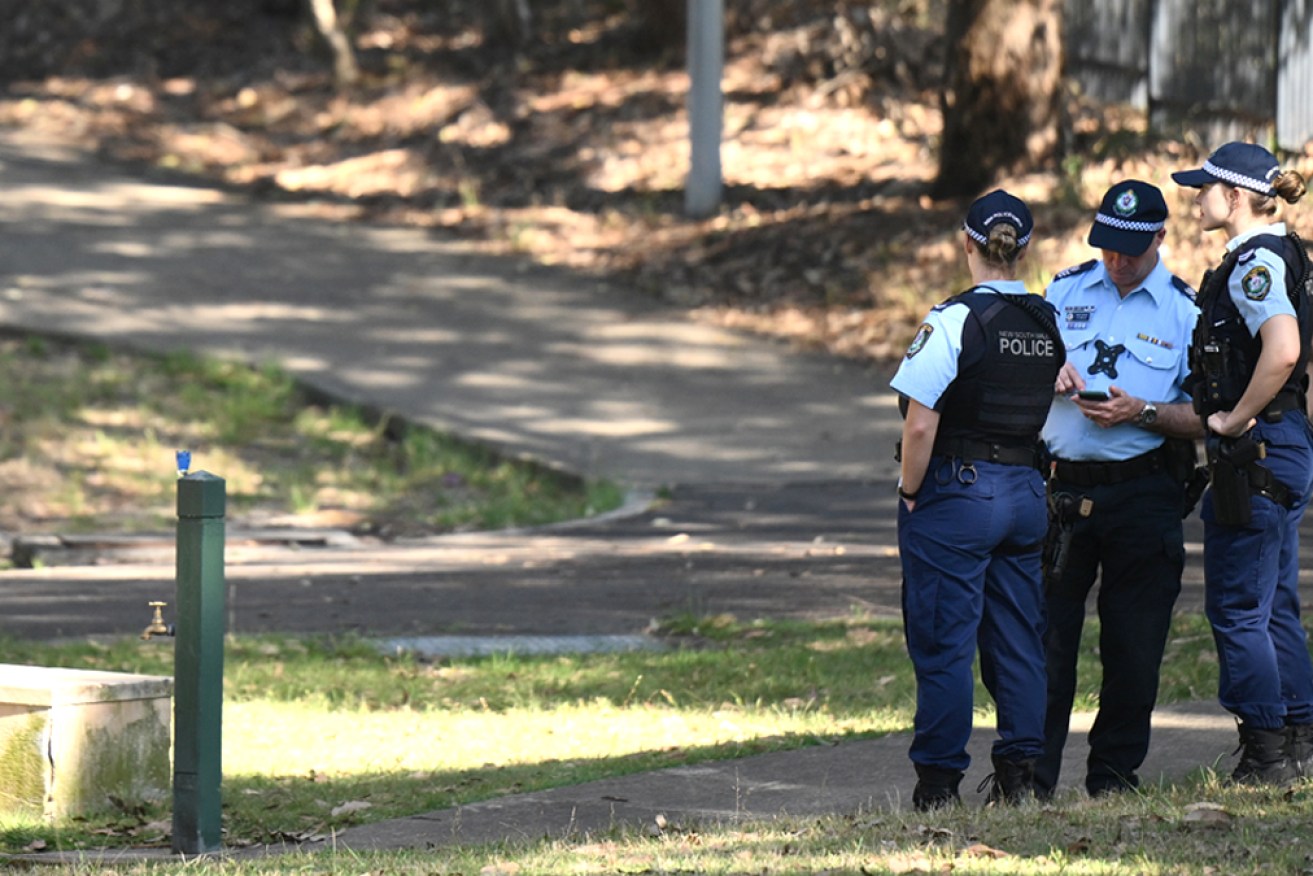 Police in the Rouse Hill park where a 17-year-old died on Monday.