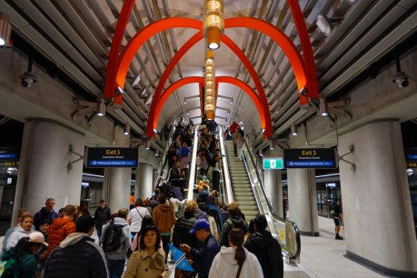 No raining on city’s parade as $15b train line opens