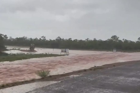 Man dies in floodwaters amid record deluge