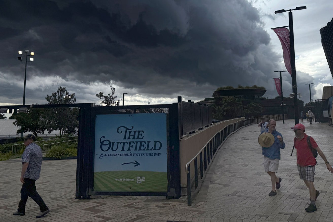 Dark clouds halted play at the SCG on day one. <i>Photo: AAP</i>