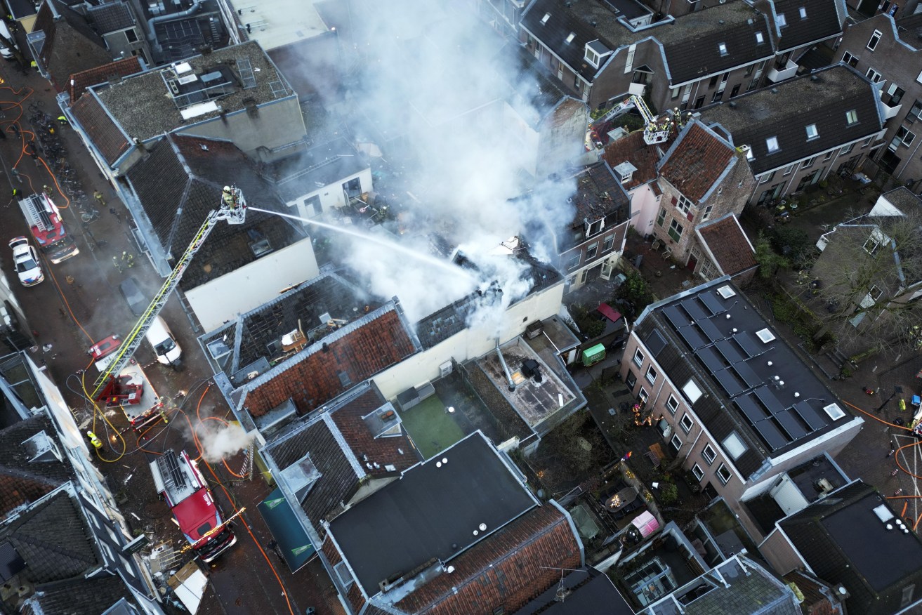 Dutch authorities say the cause of a blast and large fire in Utrecht remains unknown.
