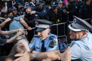 'Punched him in the head': Protest outcry