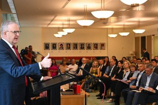 PM celebrates caucus unity, but does have a cost