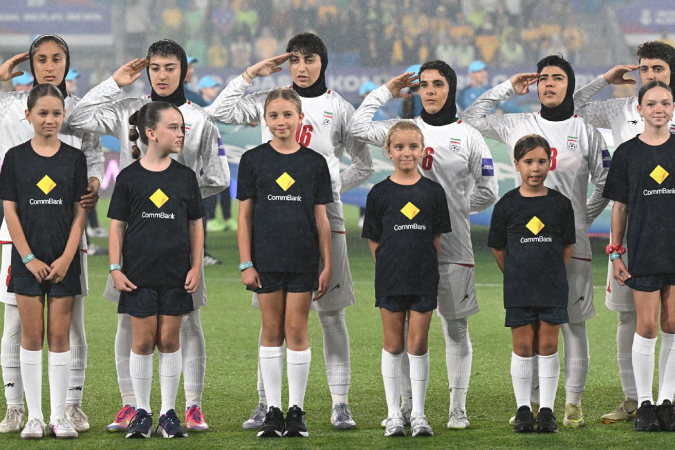 Iran players saluted instead of singing their national anthem before the Matildas match. <i>Photo: AAP</i>