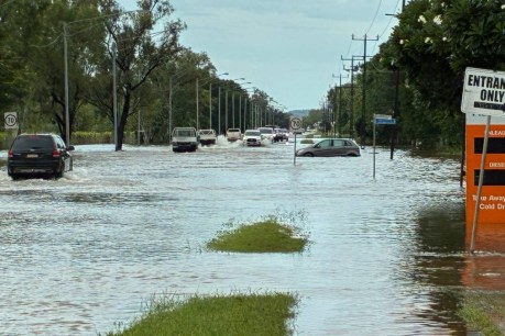 Flood-stricken town braces to 'go through it again'