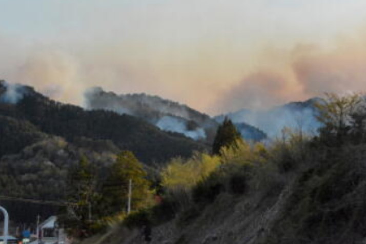 Huge wildfires compound tsunami pain in Japan town