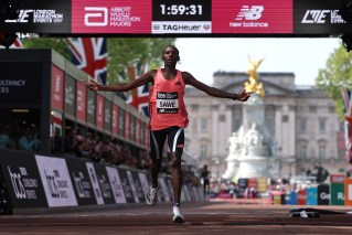 Kenyan breaks fabled marathon record